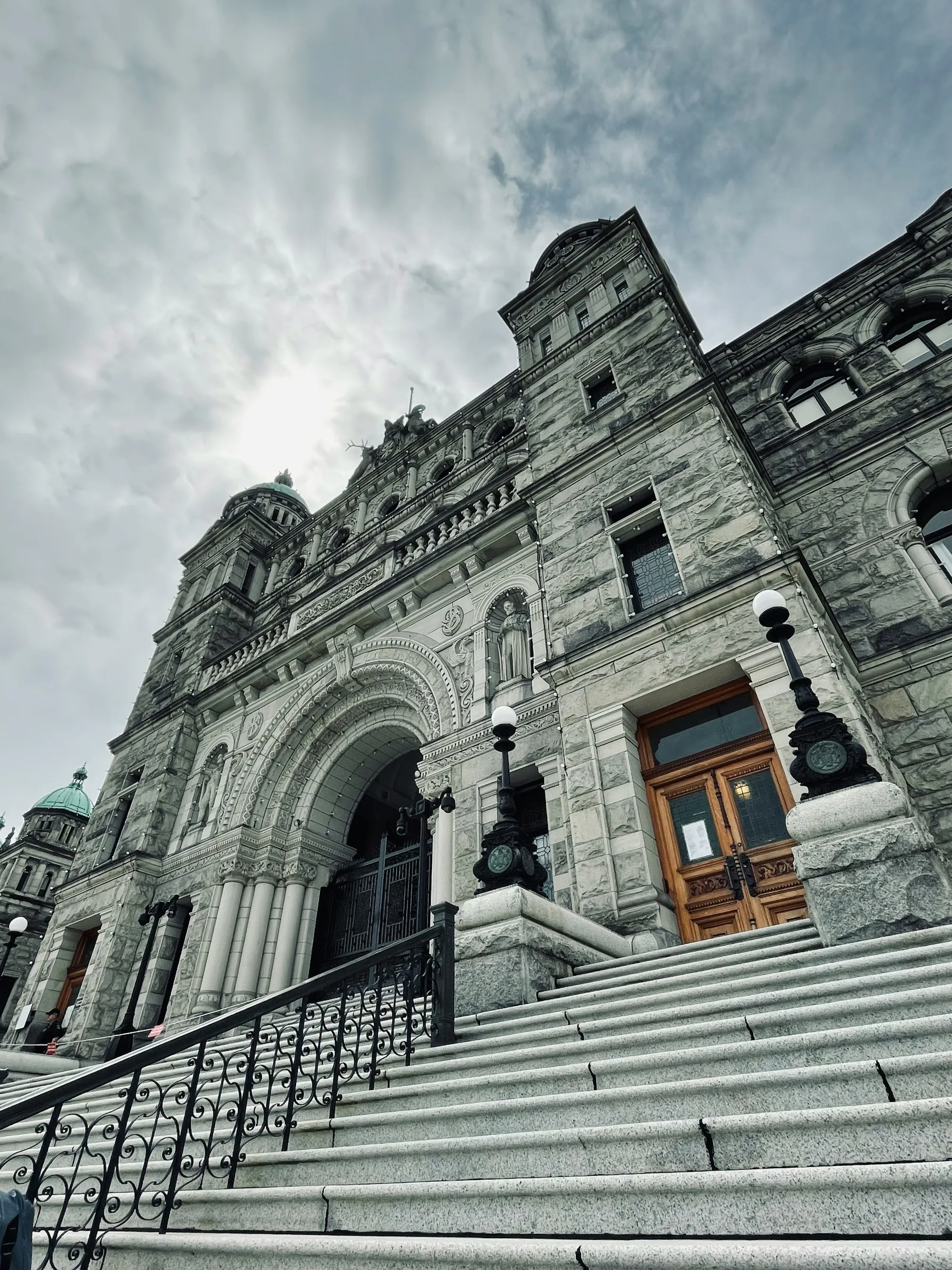 Stately government building with stone columns and entrance.