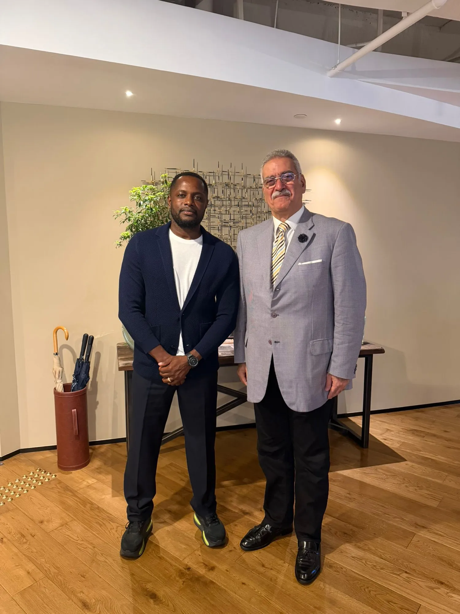 Pierre Olivier Bakalag standing with the President of the Arab Chamber of Commerce.